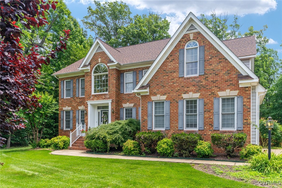 3541 Kings Farm Drive Midlothian, VA 23113 - Photo 3 of 49 a front view of a house with a yard