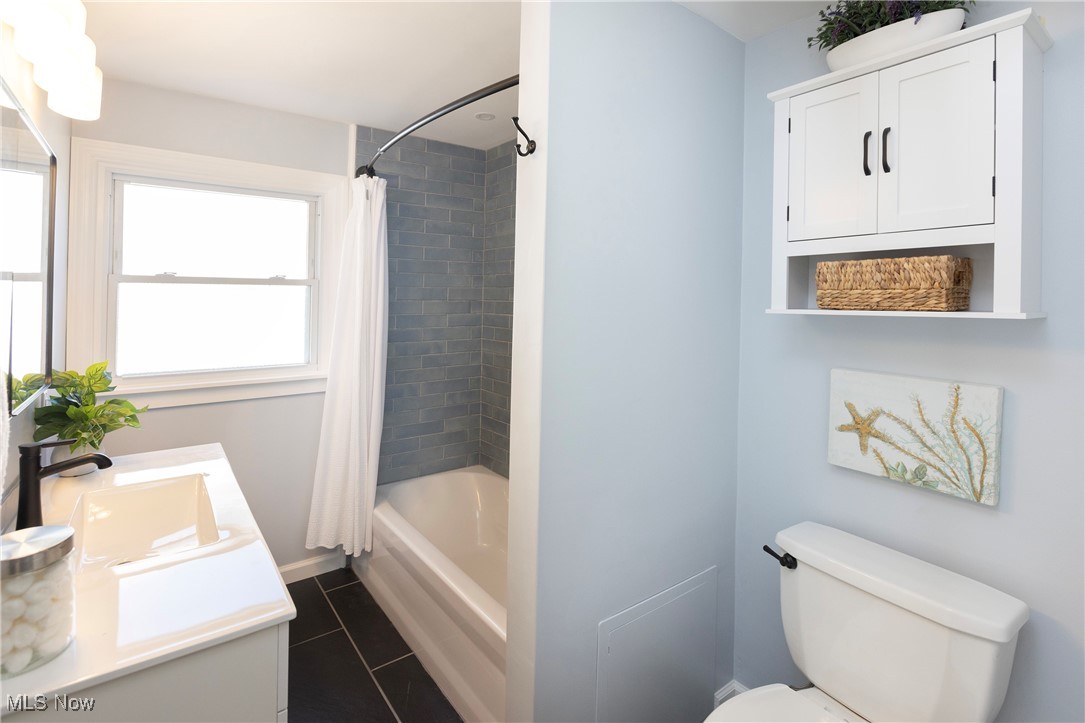 2783 Hampton Road Rocky River, OH 44116 - Photo 20 of 41 The fully updated full bath is stunning! Enjoy custom tile work, shelves for your products, new vanity, lighting and ceramic floor