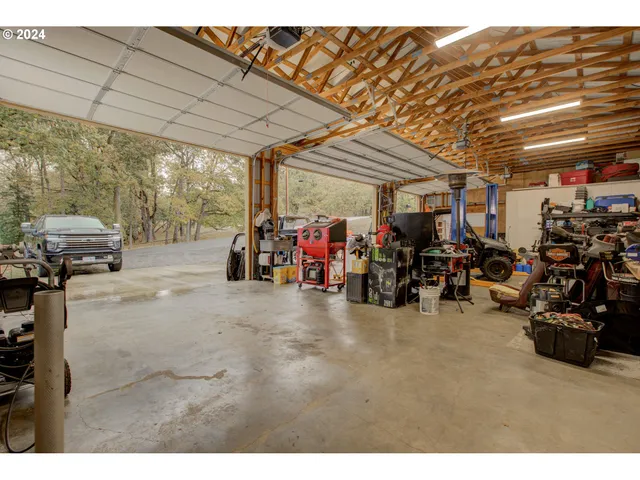 a view of a big room with gym equipment