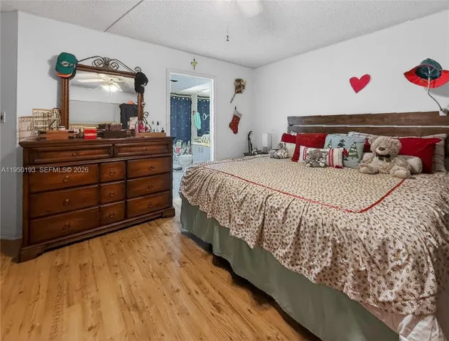 a bedroom with a bed and a closet