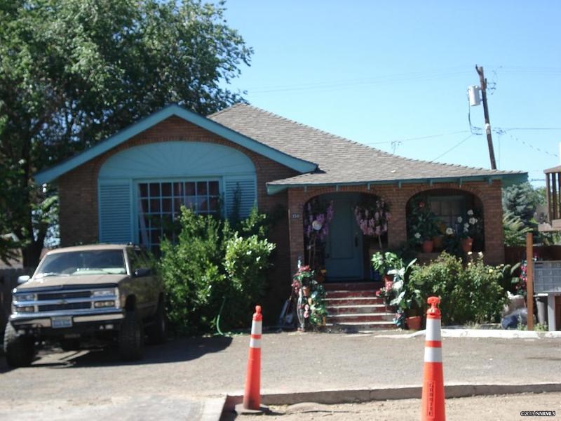 350 Cheney Street Reno, NV 89502 - Photo 1 of 1 a front view of a house with garden
