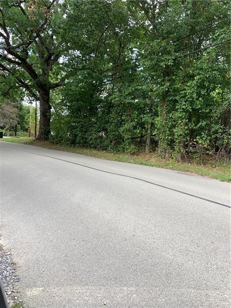 348 Rich Hill Road Cheswick, PA 15024 - Photo 2 of 5 a view of a yard with a tree