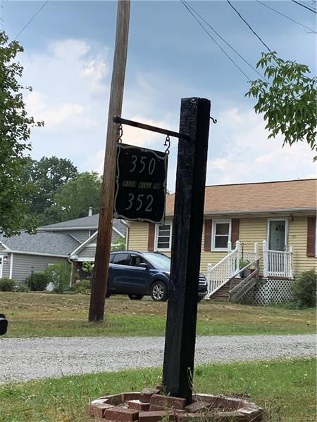 348 Rich Hill Road Cheswick, PA 15024 - Photo 5 of 5 a front view of a house with a yard