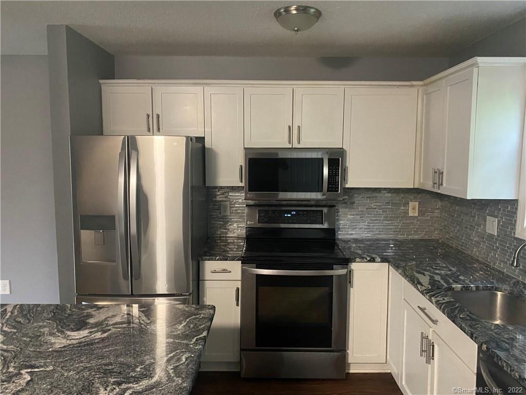 929 North Colony Road, Unit 2 Meriden, CT 06450 - Photo 1 of 1 Kitchen with Stainless Steel Appliances