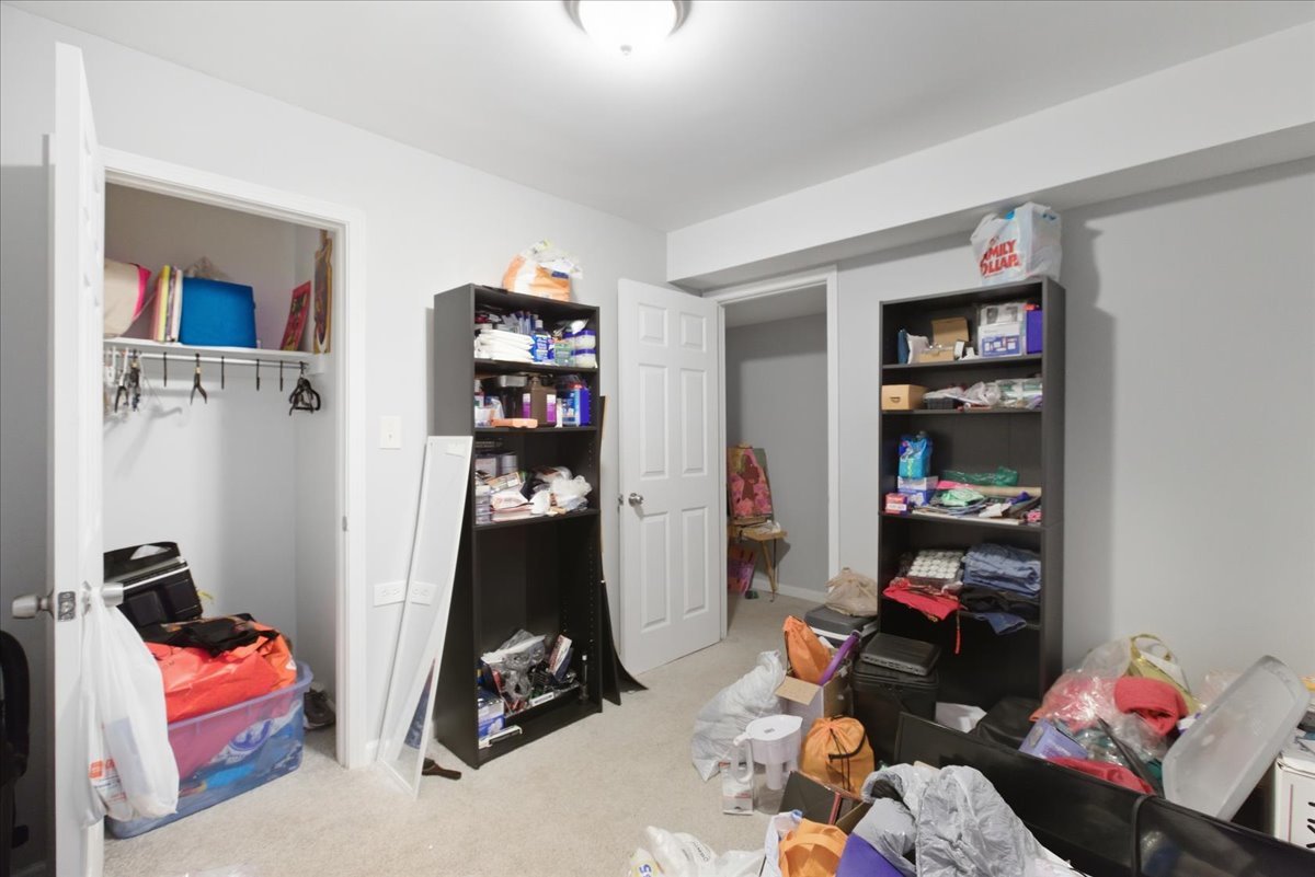 4423 South Prairie Avenue, Unit GARDEN Chicago, IL 60653 - Photo 13 of 13 a room with furniture and gym equipment