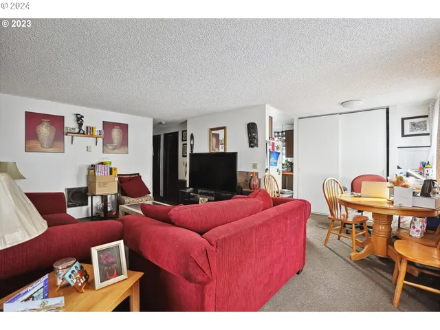 a bedroom with furniture and a bed