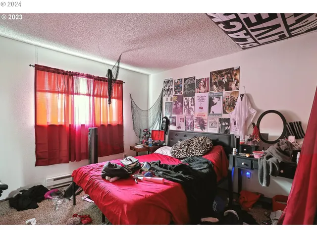 a bathroom with a sink and a shower curtain