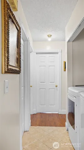 a bedroom with a bed and a fireplace