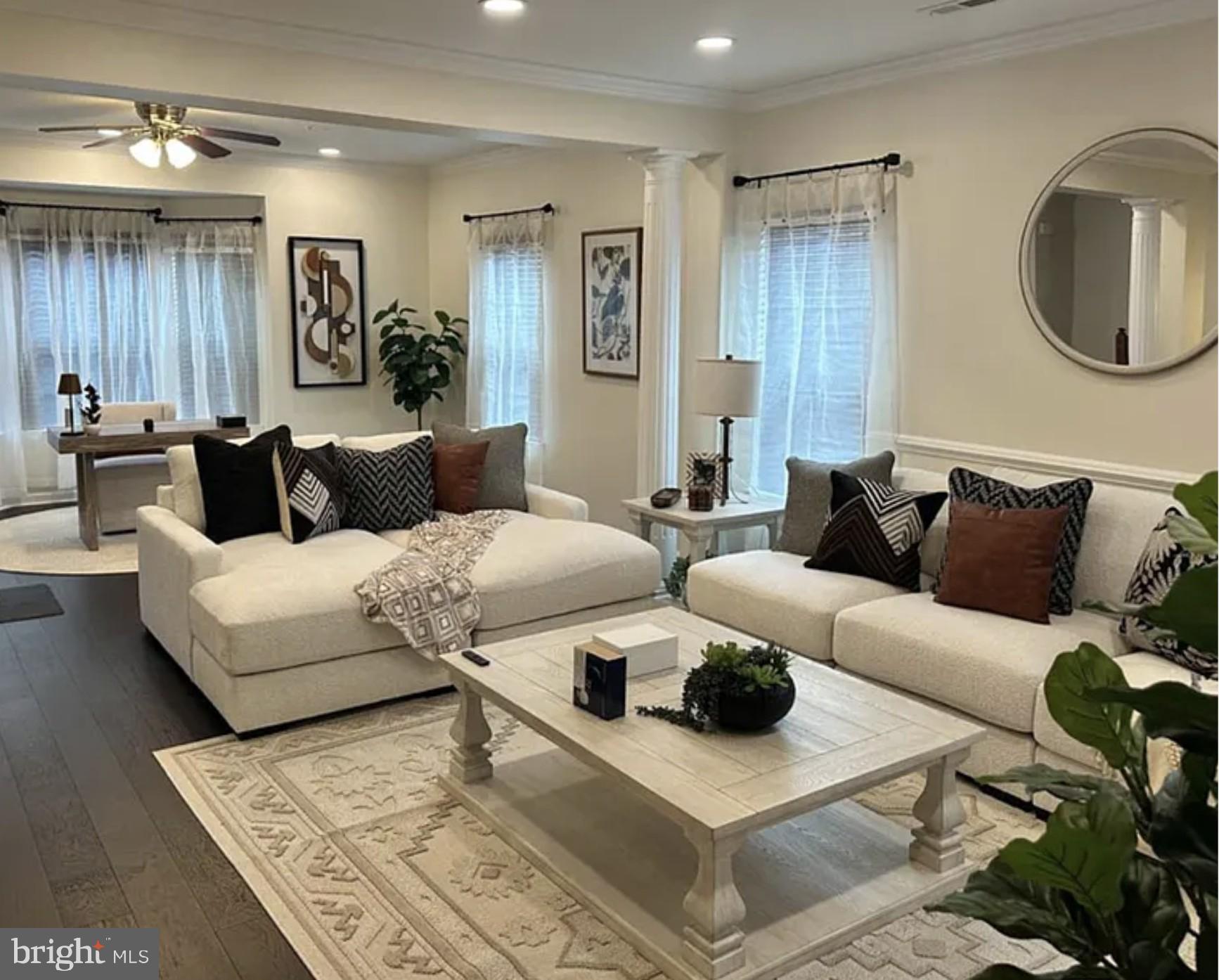 15145 Leicestershire Street Woodbridge, VA 22191 - Photo 1 of 19 a living room with furniture and a mirror