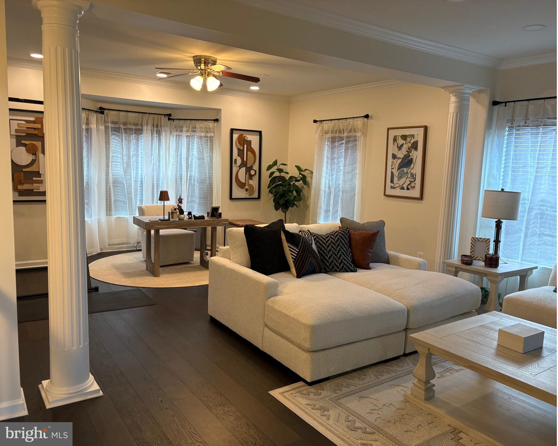 15145 Leicestershire Street Woodbridge, VA 22191 - Photo 15 of 19 a bedroom with a bed and a couch