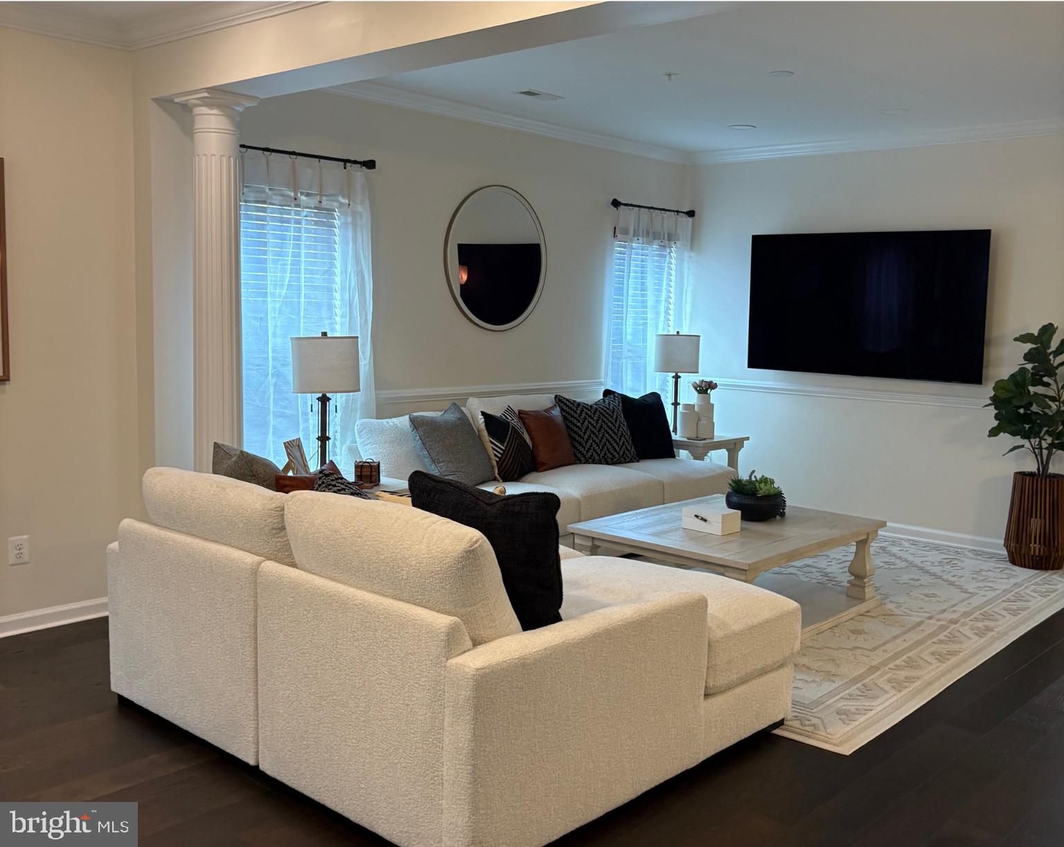 15145 Leicestershire Street Woodbridge, VA 22191 - Photo 2 of 19 a living room with furniture and a flat screen tv