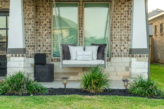 a garden view with a seating space