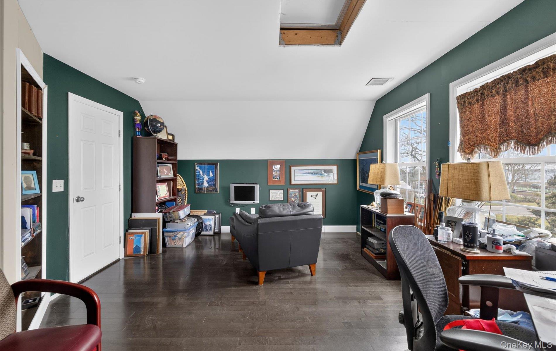 108 Awixa Avenue Bay Shore, NY 11706 - Photo 31 of 50 a living room with furniture and a large window