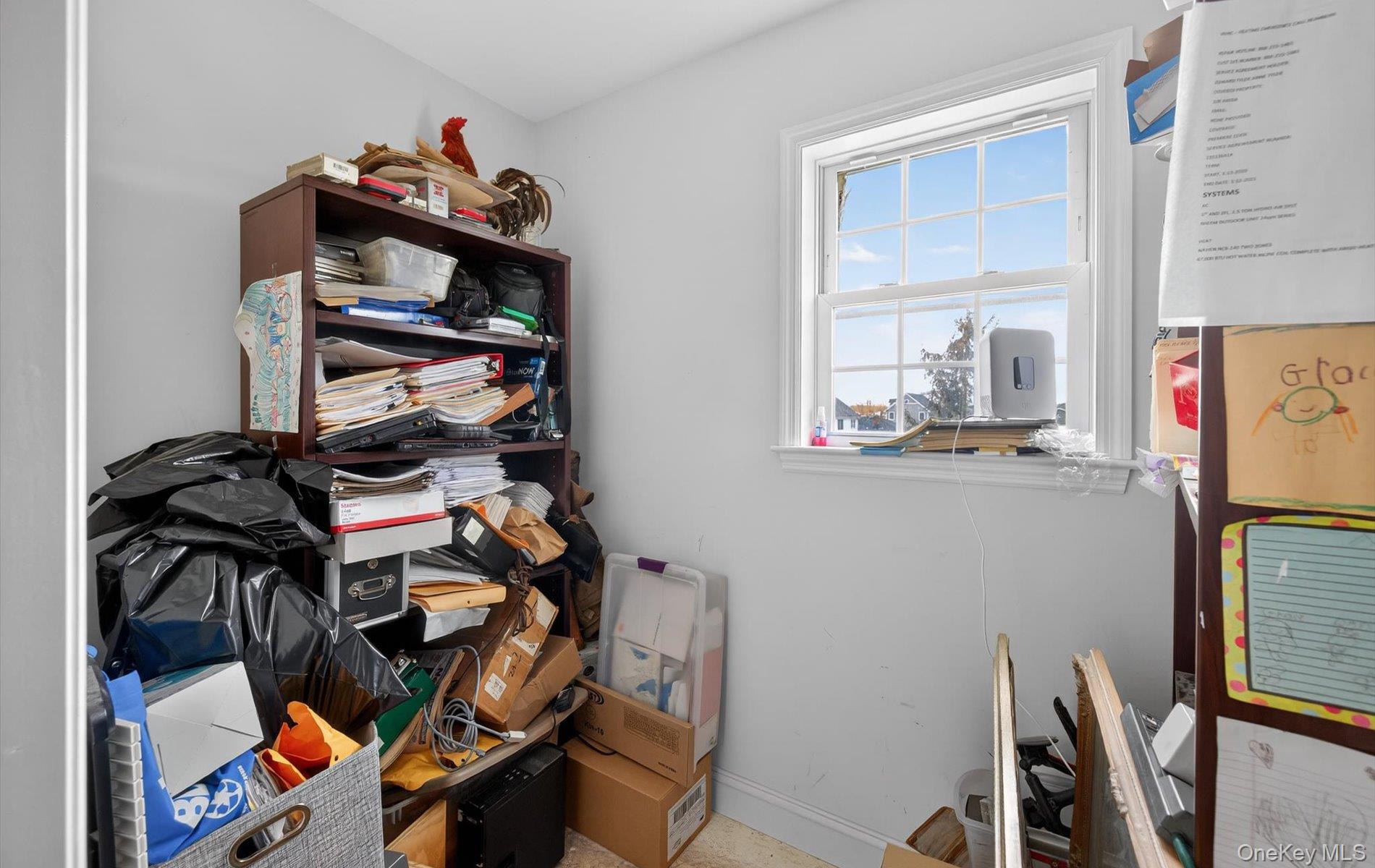 108 Awixa Avenue Bay Shore, NY 11706 - Photo 32 of 50 a view of walk in closet with clothes and shoes