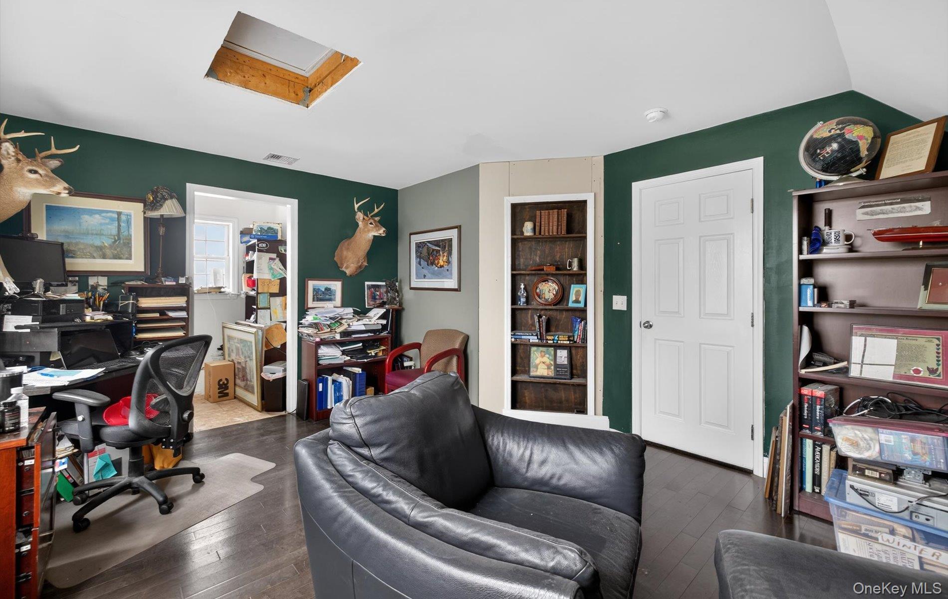 108 Awixa Avenue Bay Shore, NY 11706 - Photo 33 of 50 a living room with furniture and a wooden floor