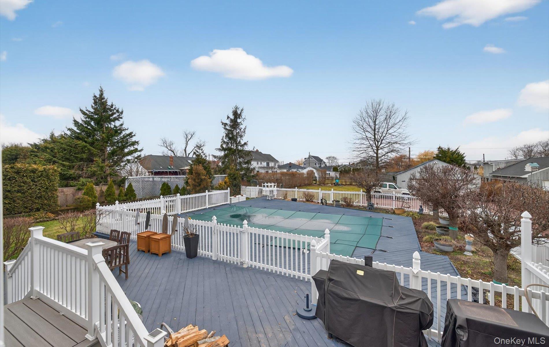 108 Awixa Avenue Bay Shore, NY 11706 - Photo 37 of 47 View of pool with a fenced backyard, a residential view, a deck, and grilling area
