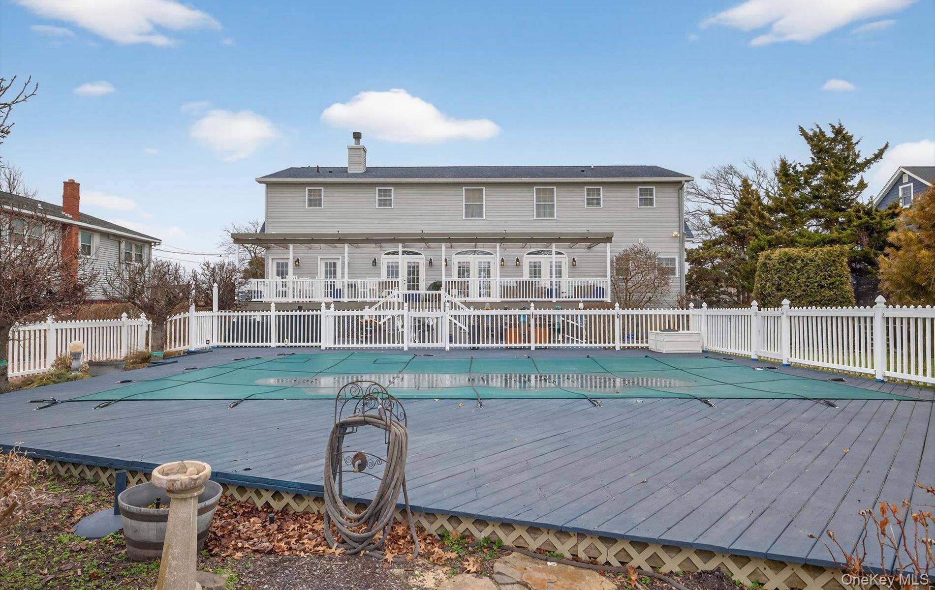 108 Awixa Avenue Bay Shore, NY 11706 - Photo 41 of 47 View of pool with a wooden deck