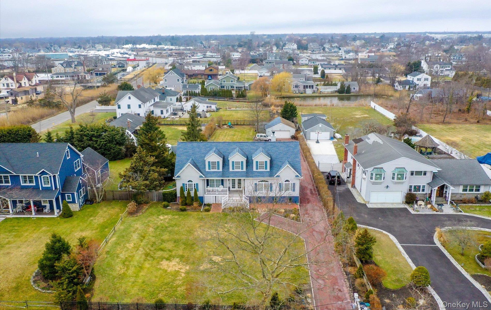 108 Awixa Avenue Bay Shore, NY 11706 - Photo 43 of 47 Aerial perspective of suburban area