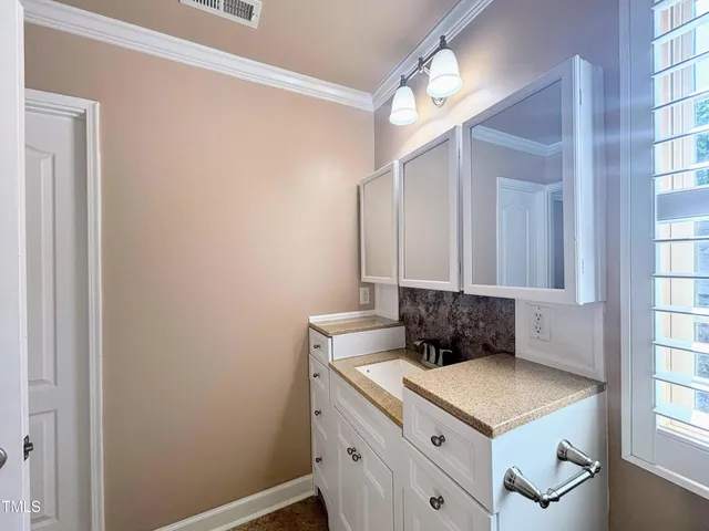 a sign on the side of the road