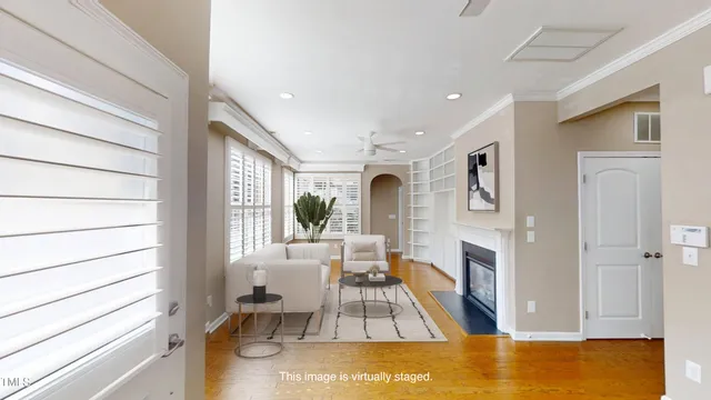 a view of an entryway with wooden floor and a window