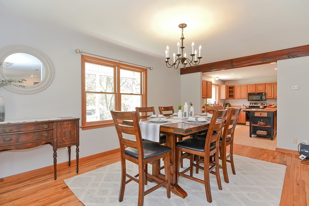 71 Lancaster Road Shirley, MA 01464 - Photo 13 of 34 a view of a dining room with furniture window and wooden floor