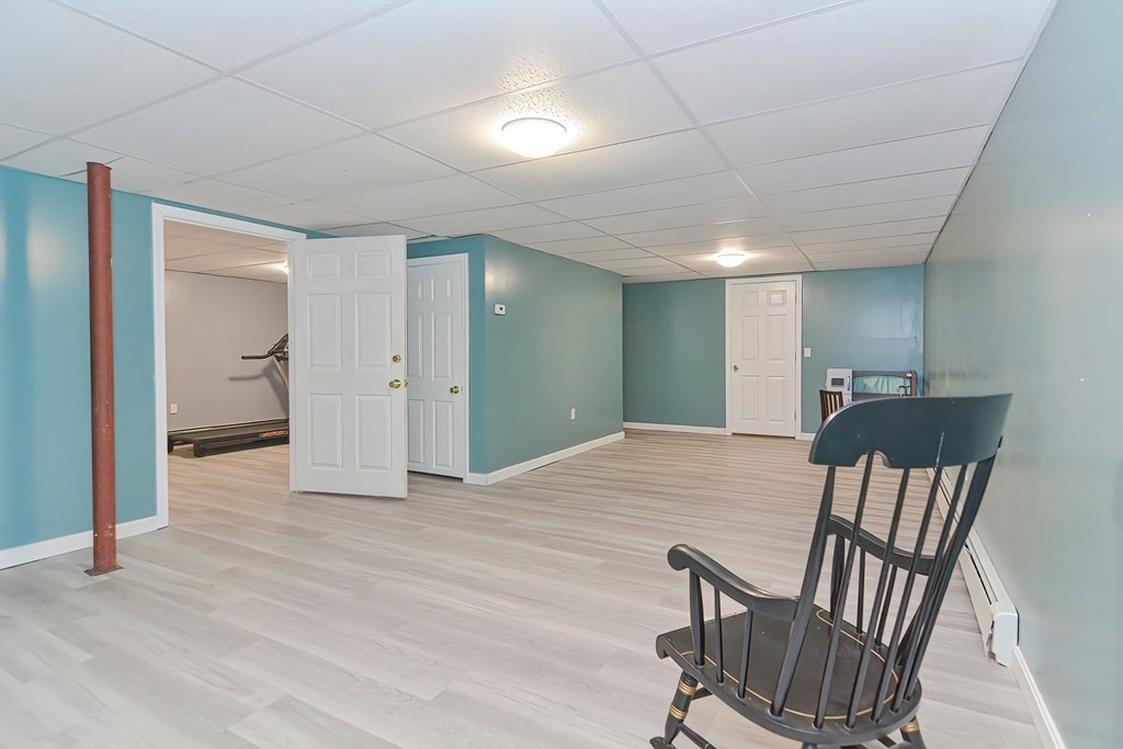 71 Lancaster Road Shirley, MA 01464 - Photo 28 of 34 a view of livingroom with furniture and wooden floor