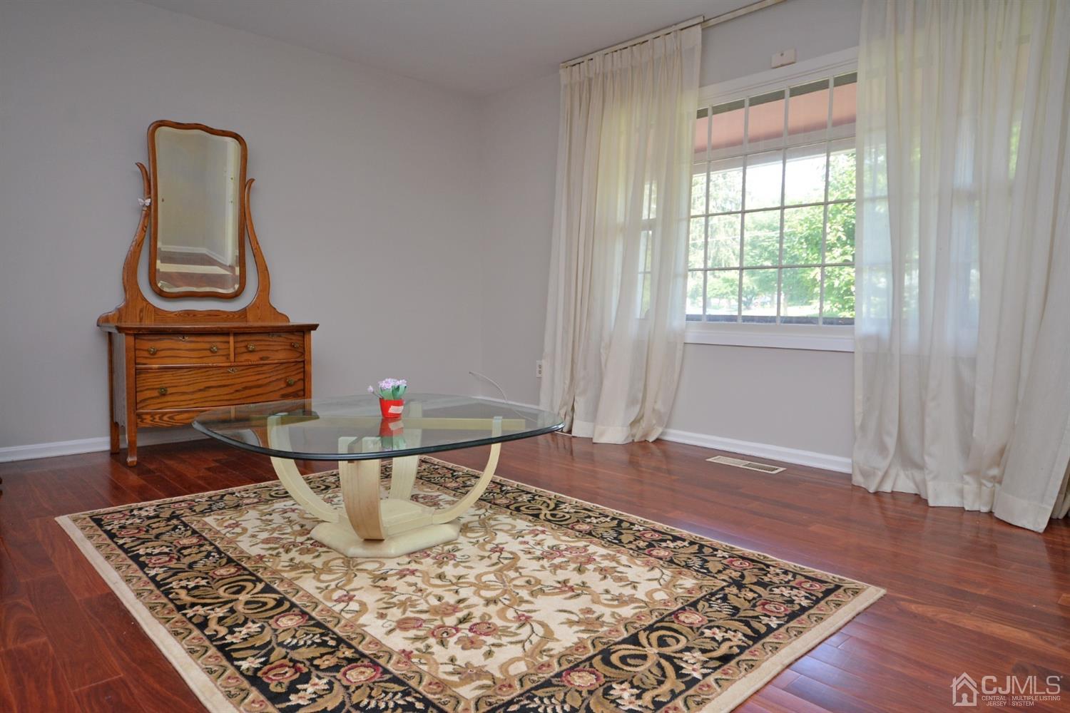 44 Johnson Road Somerset, NJ 08873 - Photo 3 of 27 a view of a workspace filled with furniture