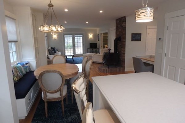 2 Strikers Way Chilmark, MA 02535 - Photo 12 of 33 a large kitchen with a table and chairs