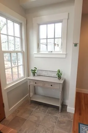 a room with window and tub