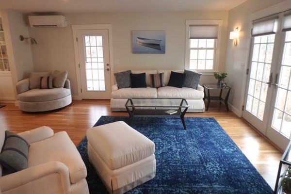 2 Strikers Way Chilmark, MA 02535 - Photo 4 of 33 a living room with furniture and a rug