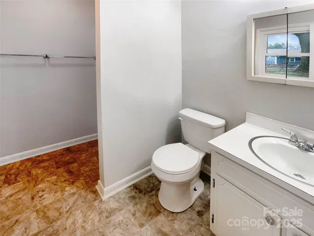 a bathroom with a sink and a toilet