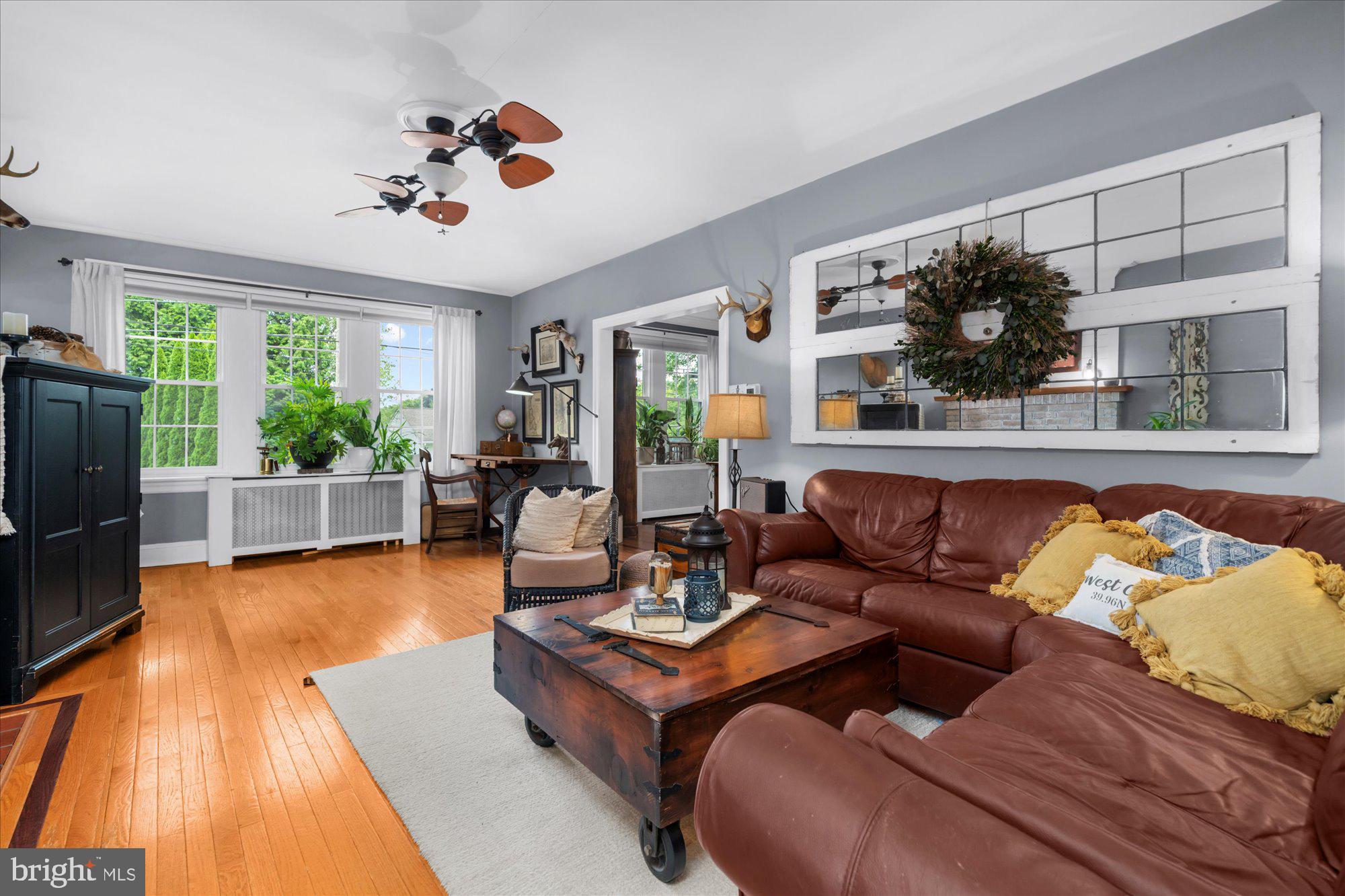 10 North Concord Road West Chester, PA 19382 - Photo 11 of 60 a living room with furniture and a large window