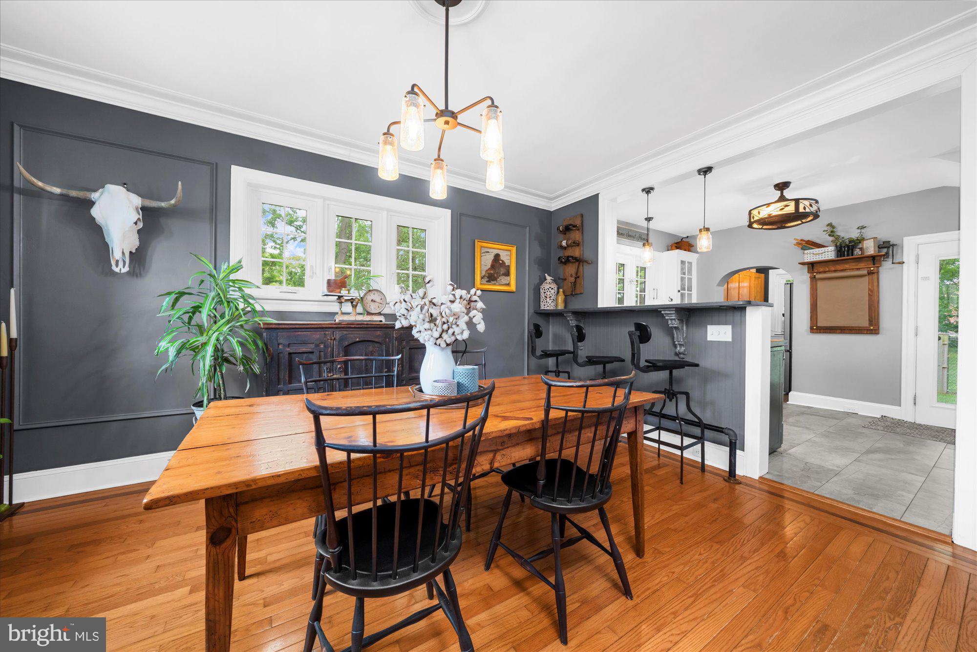 10 North Concord Road West Chester, PA 19382 - Photo 18 of 60 a view of a dining room with furniture and wooden floor