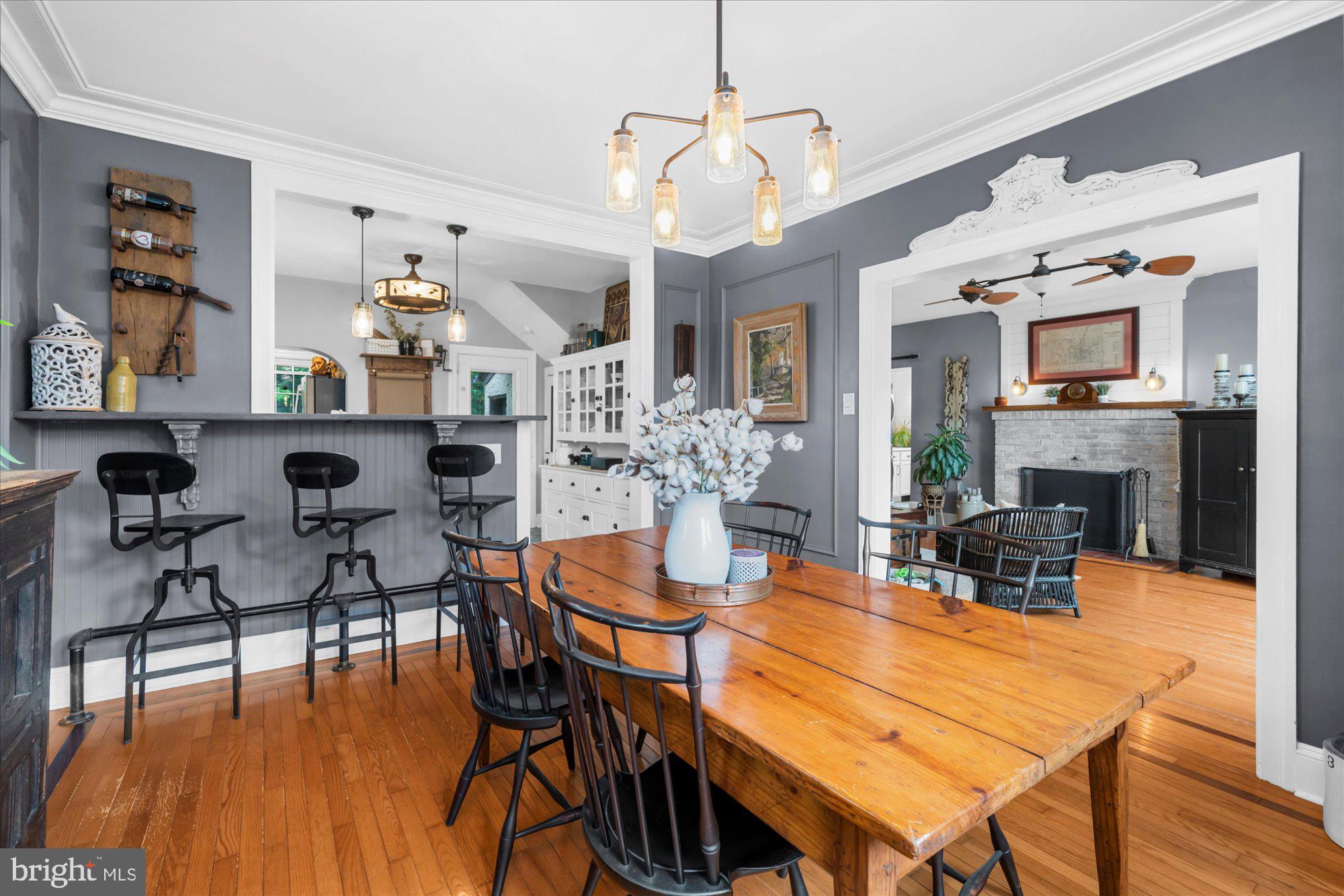10 North Concord Road West Chester, PA 19382 - Photo 20 of 60 a view of a dining room with furniture a chandelier and wooden floor