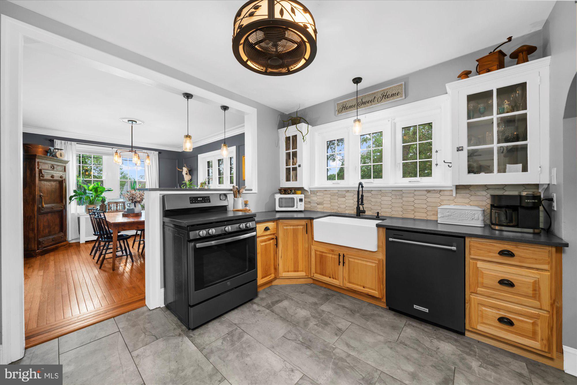 10 North Concord Road West Chester, PA 19382 - Photo 25 of 60 a kitchen with stainless steel appliances granite countertop a stove and a sink