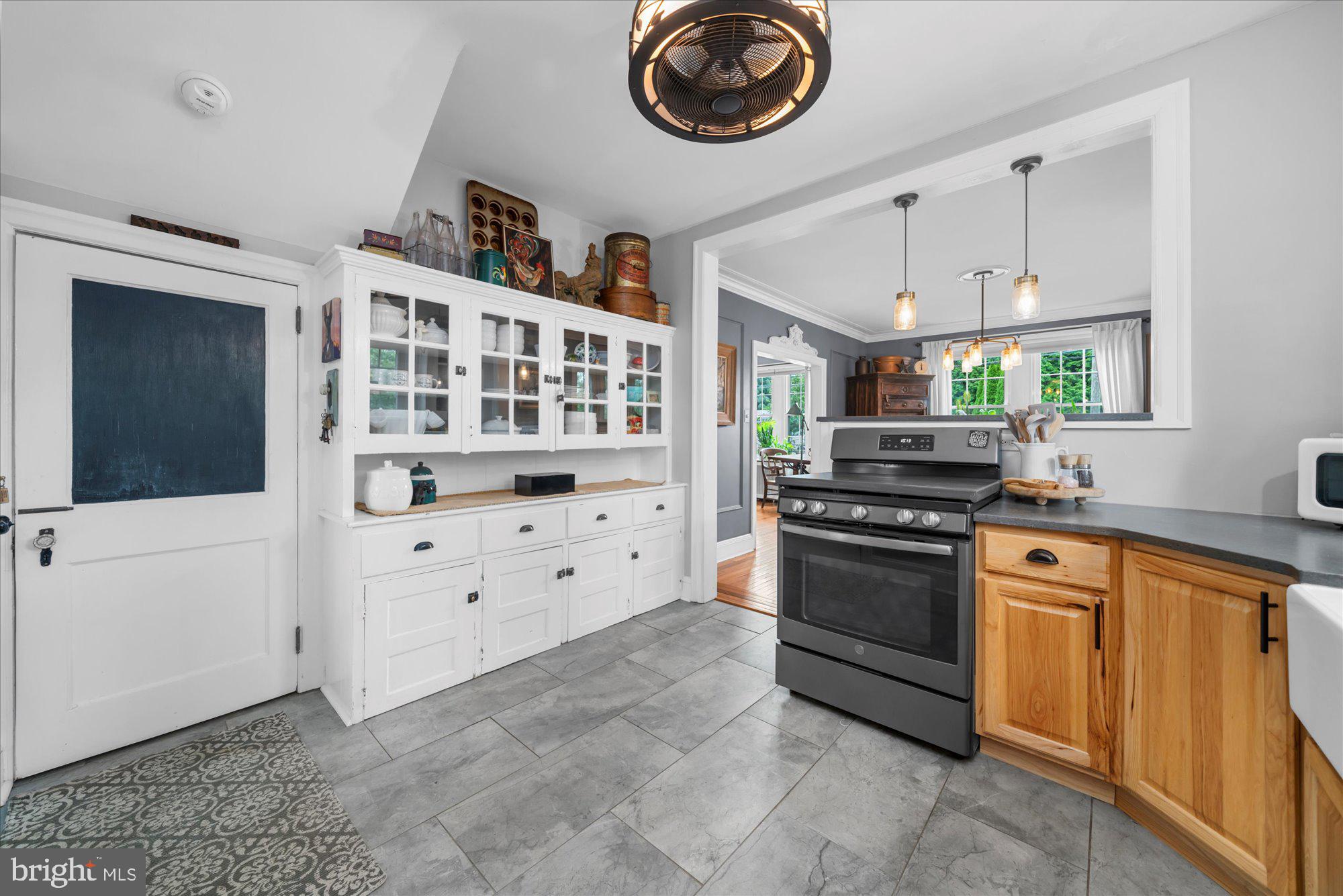 10 North Concord Road West Chester, PA 19382 - Photo 26 of 60 a kitchen with stainless steel appliances a stove a sink and a refrigerator