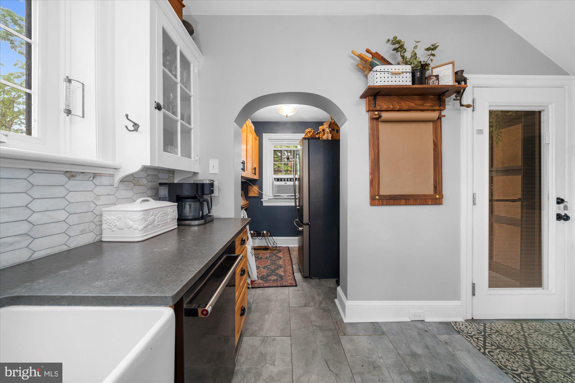 10 North Concord Road West Chester, PA 19382 - Photo 27 of 60 a kitchen with a sink and a refrigerator