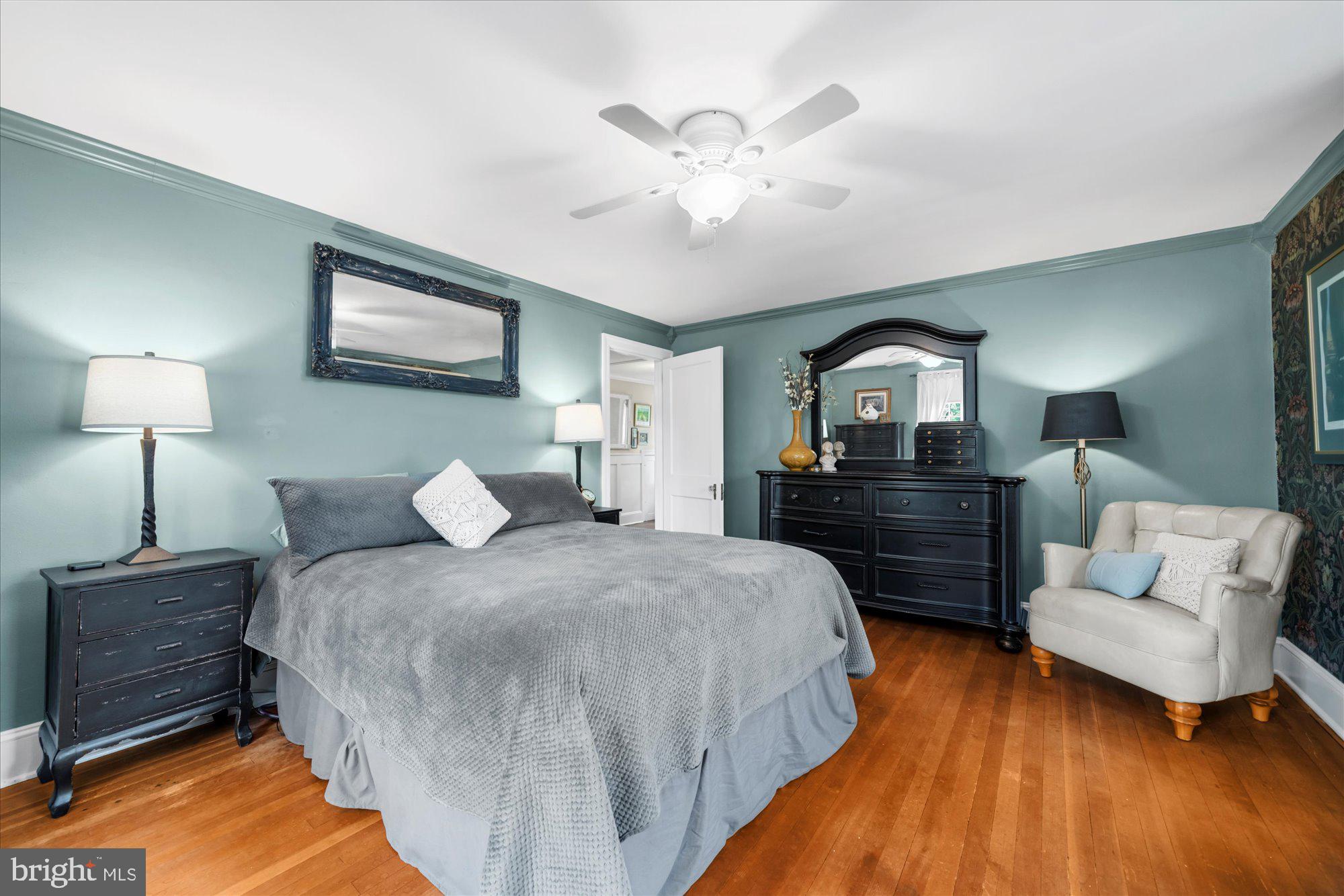 10 North Concord Road West Chester, PA 19382 - Photo 31 of 60 a bedroom with a bed and wooden floor