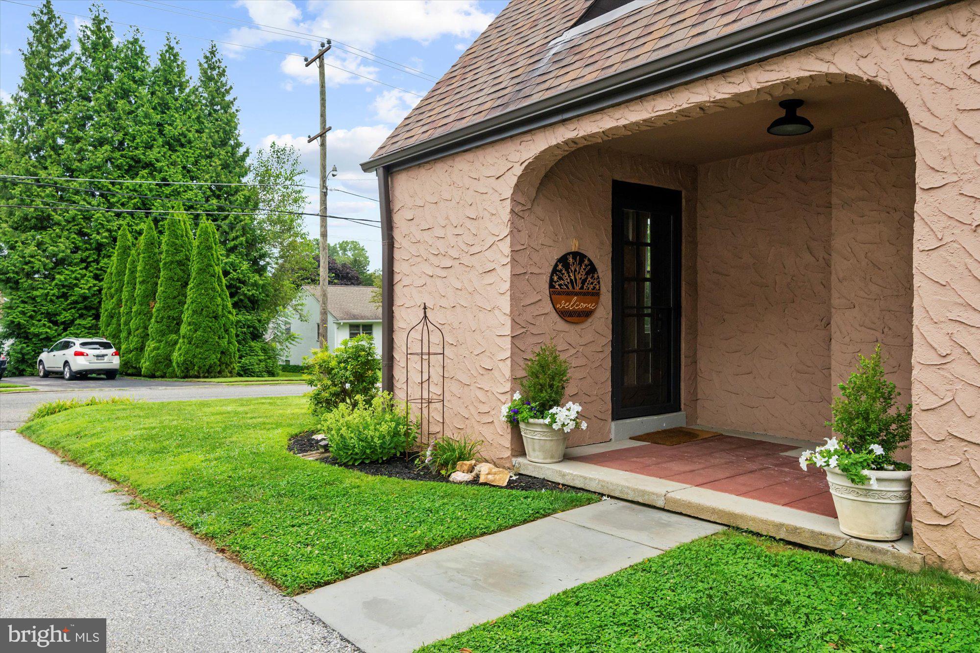 10 North Concord Road West Chester, PA 19382 - Photo 4 of 60 a front view of a house with a yard