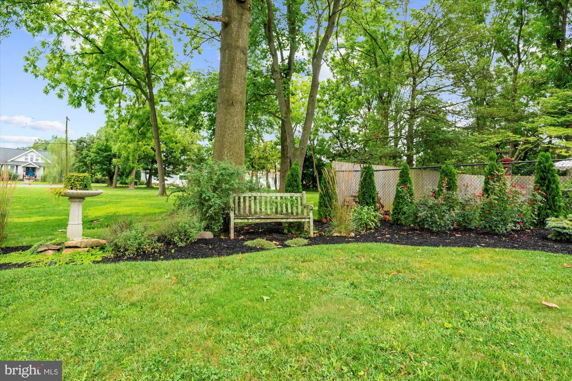 10 North Concord Road West Chester, PA 19382 - Photo 48 of 60 a view of a house with a big yard and large trees