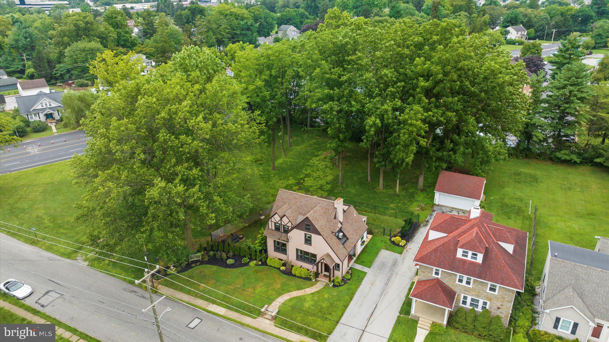 10 North Concord Road West Chester, PA 19382 - Photo 55 of 60 an aerial view of a house with garden space and street view