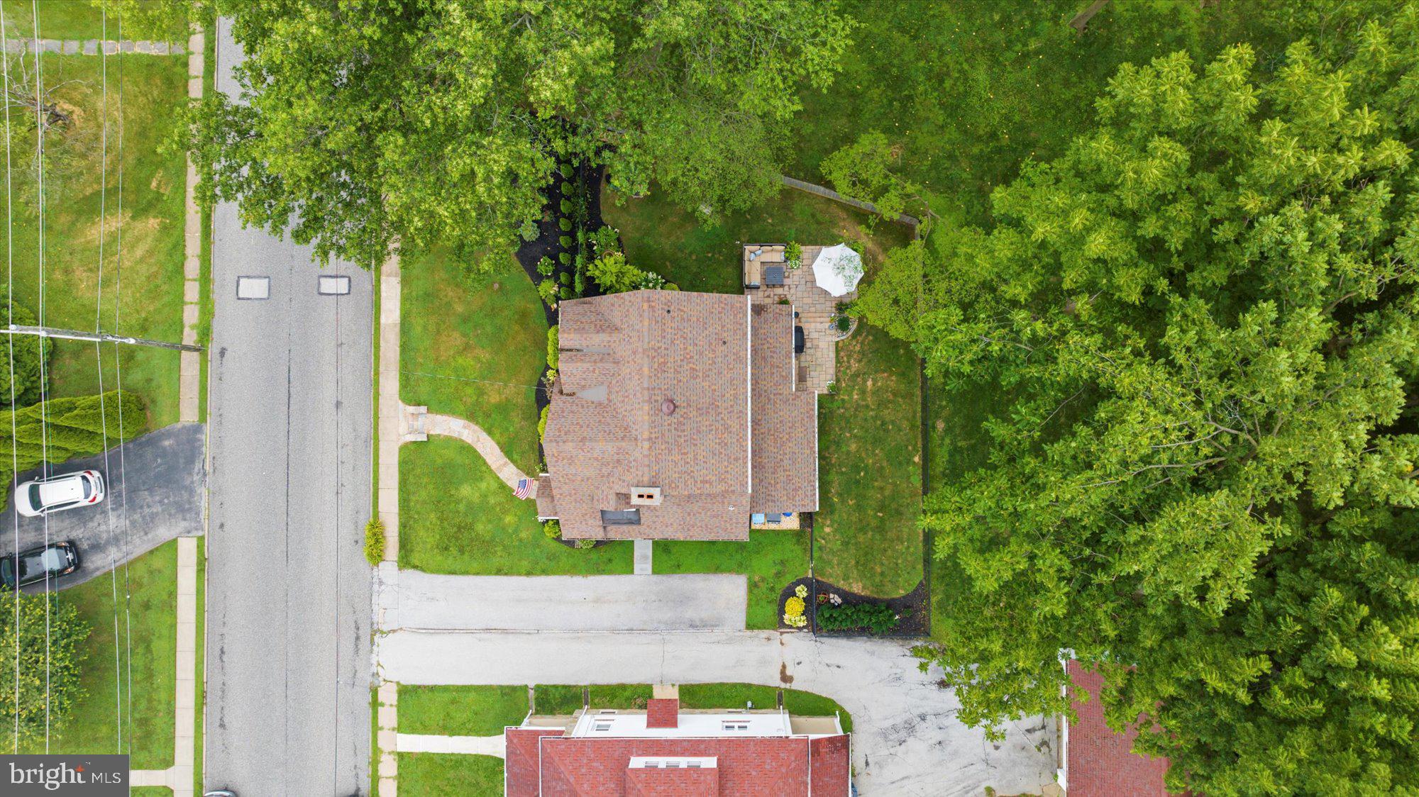 10 North Concord Road West Chester, PA 19382 - Photo 56 of 60 an aerial view of a house with a yard and large tree
