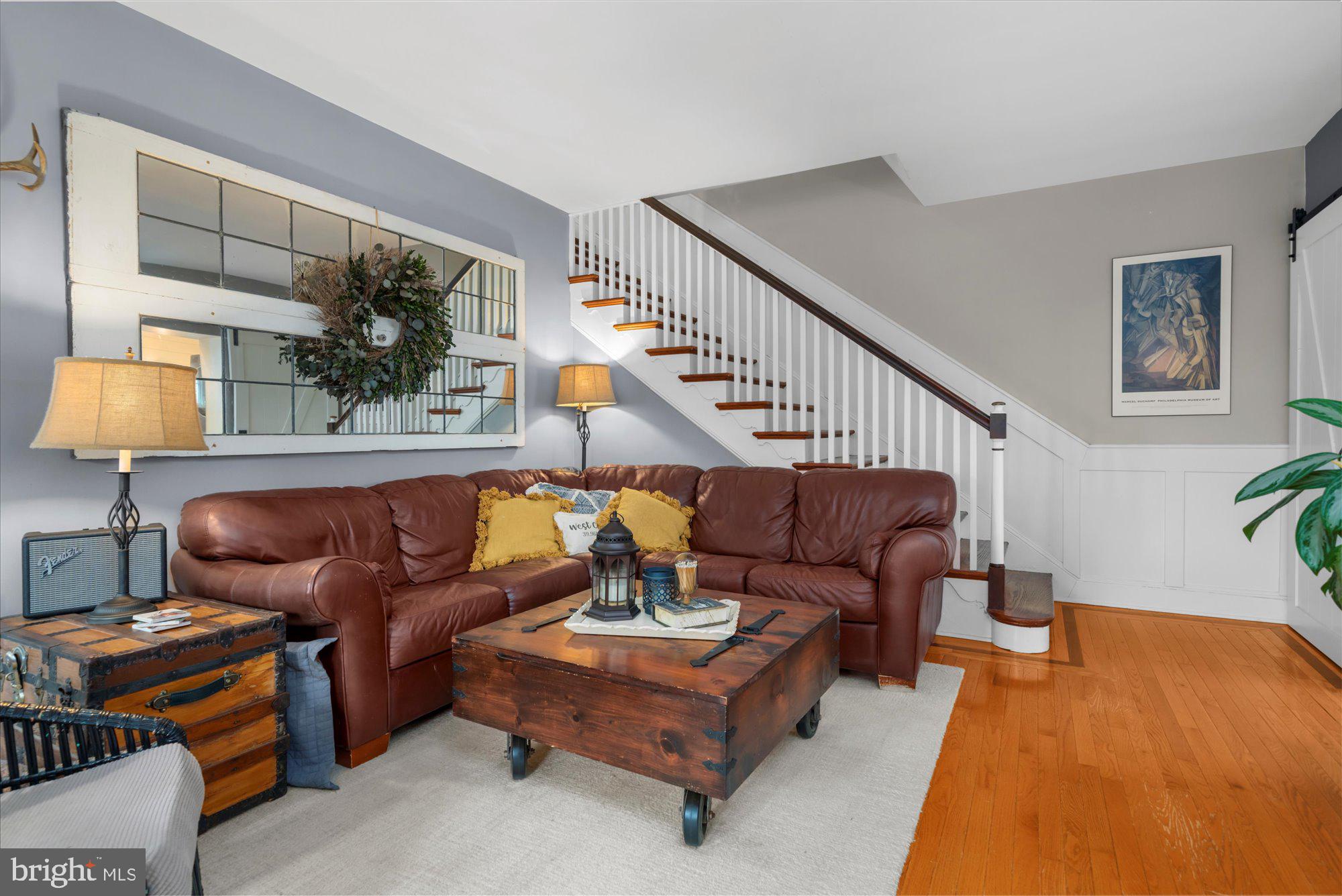 10 North Concord Road West Chester, PA 19382 - Photo 9 of 60 a living room with furniture and a lamp