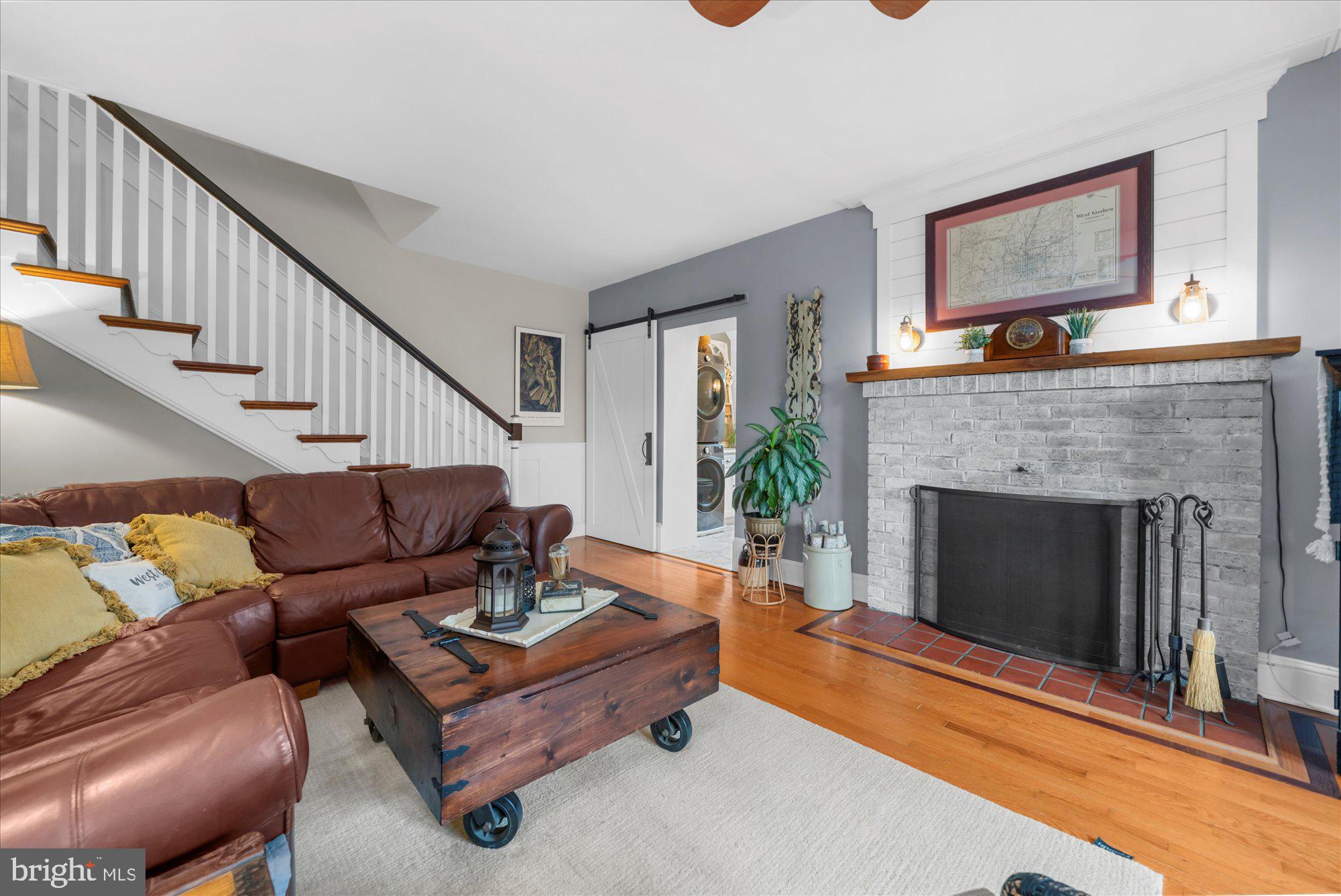 10 North Concord Road West Chester, PA 19382 - Photo 10 of 60 a living room with furniture and a fireplace