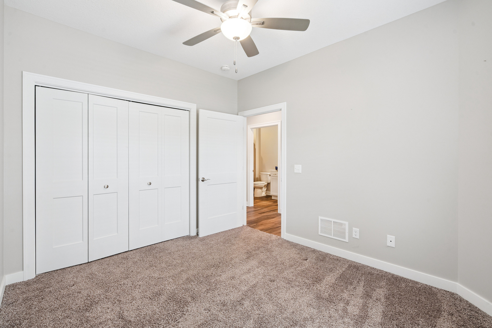 2406 13th Street Silvis, IL 61282 - Photo 15 of 22 a view of an empty room and chandelier fan