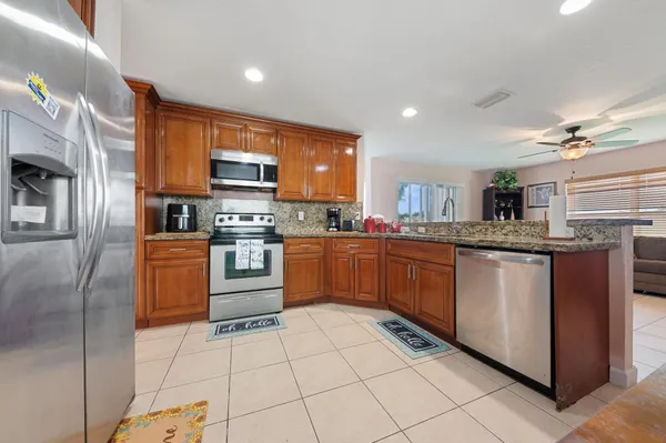 $512,000 | 5217 Rising Comet Lane, Greenacres, FL 33463