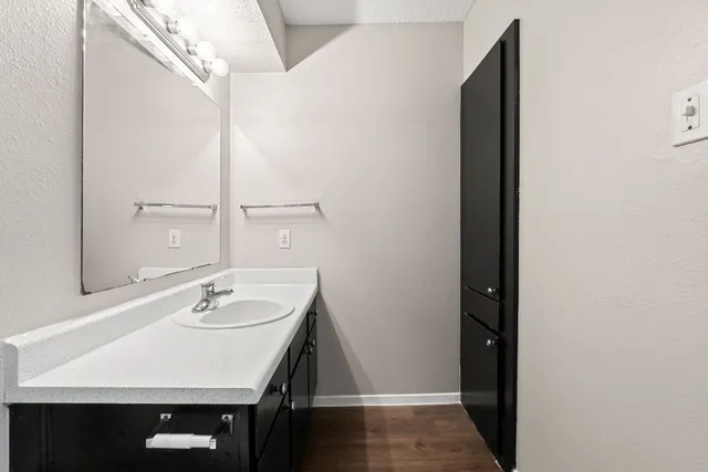 a bathroom with a bathtub and a toilet