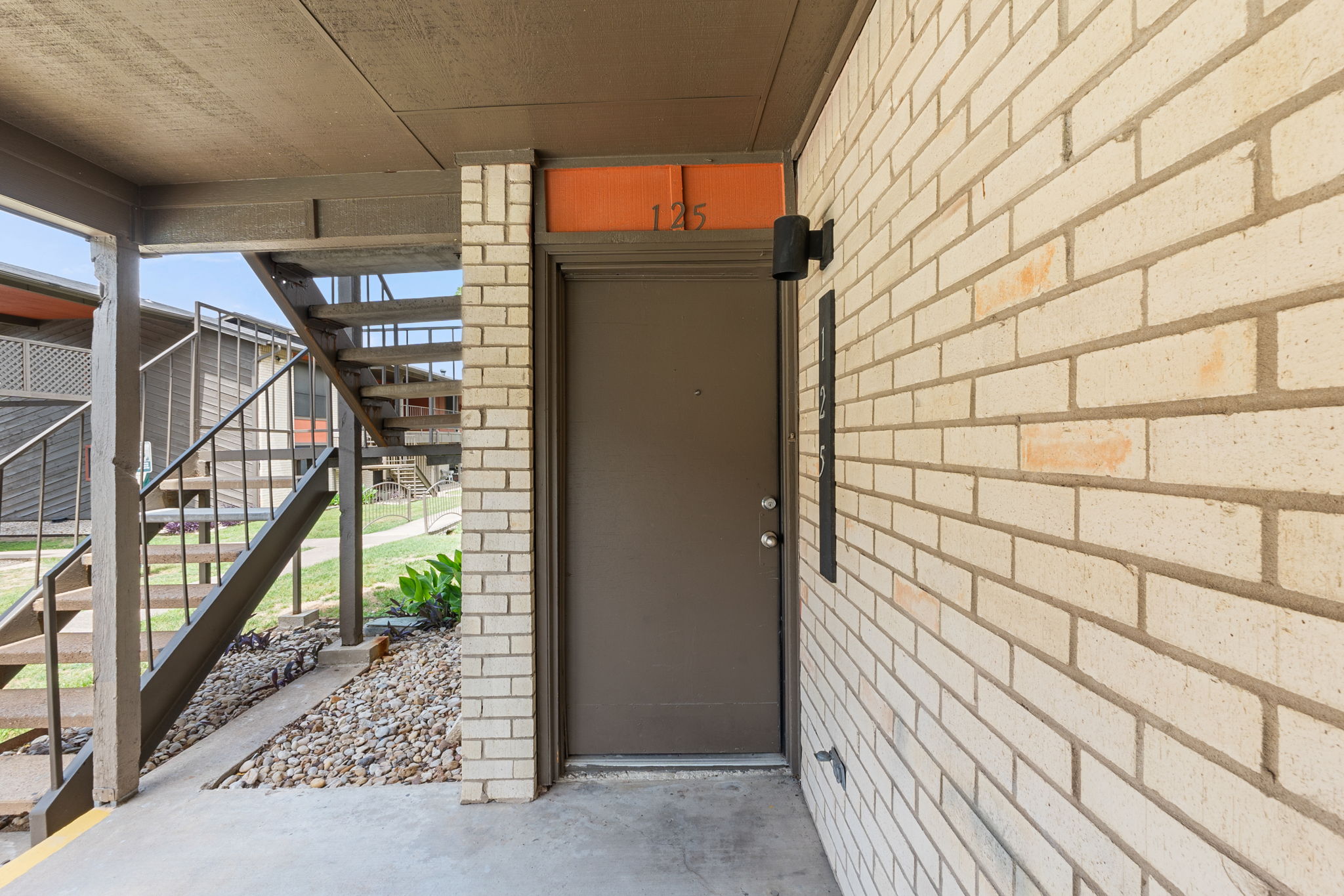 2001 South Interstate 35 Frontage Road, Unit 229 Austin, TX 78741 - Photo 19 of 24 View of exterior entry with brick siding