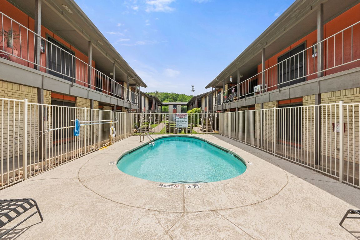 2001 South Interstate 35 Frontage Road, Unit 101 Austin, TX 78741 - Photo 20 of 24 a view of outdoor space yard swimming pool and porch