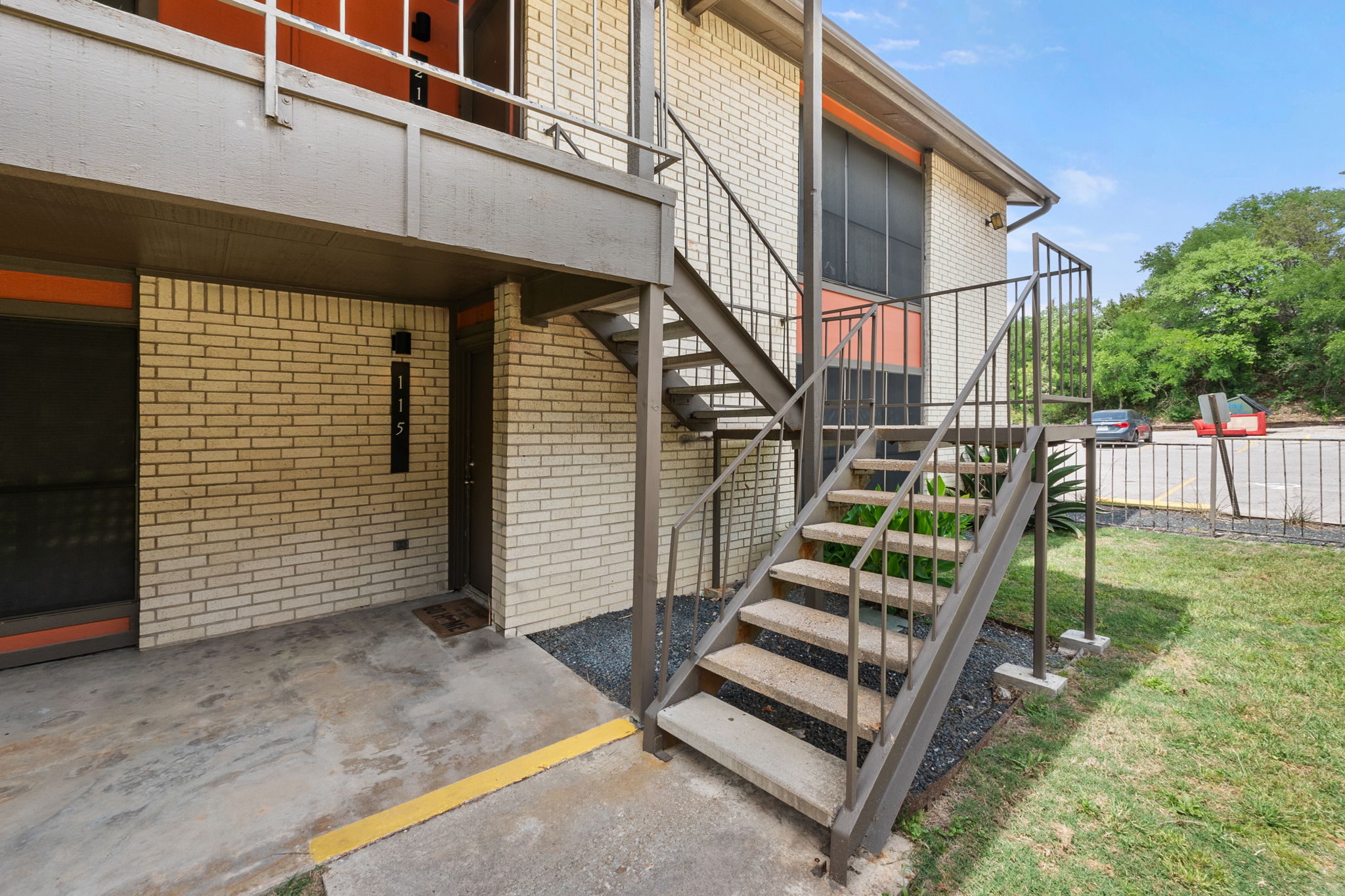 2001 South Interstate 35 Frontage Road, Unit 229 Austin, TX 78741 - Photo 22 of 24 Doorway to property with a patio and brick siding